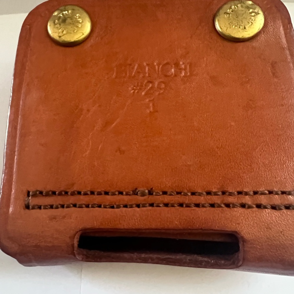 Elegant Brown Leather Wallet with Decorative Stitching